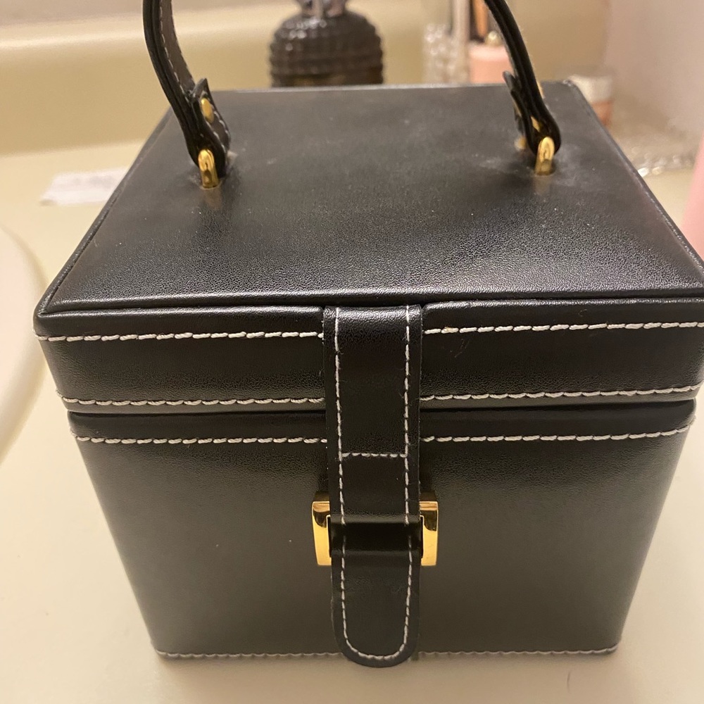 Black leather travel jewelry box
